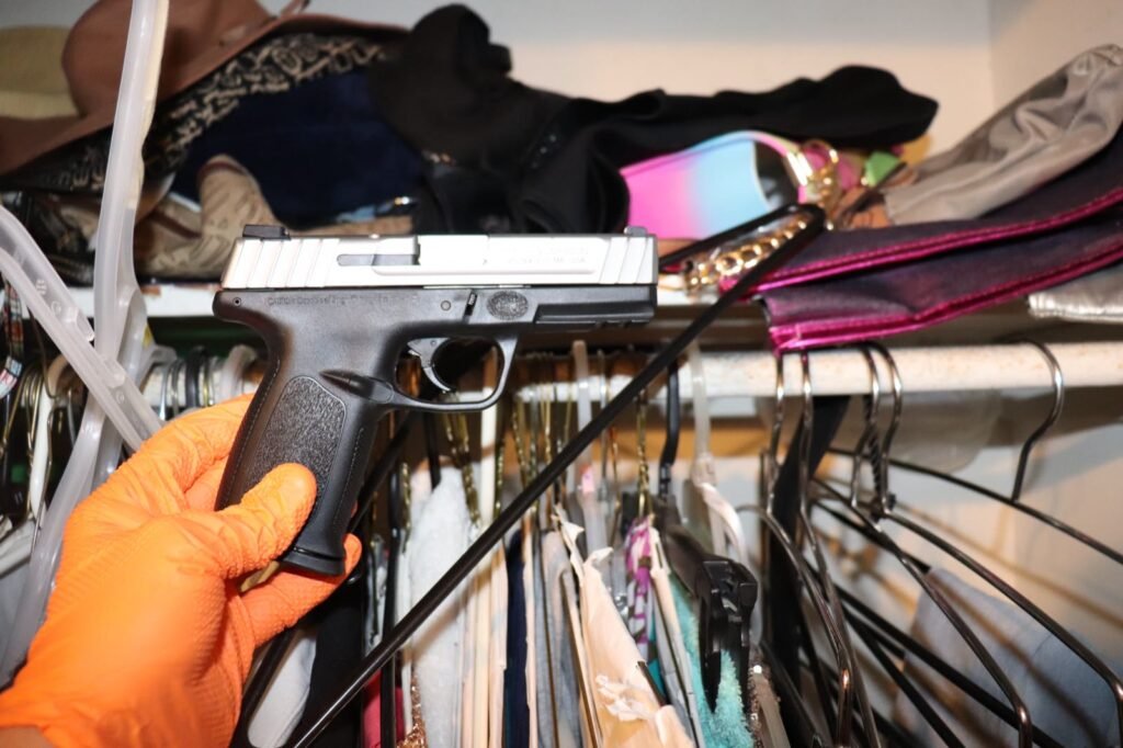 The Smith and Wesson 9mm pistol recovered from the top shelf of the bedroom closet
