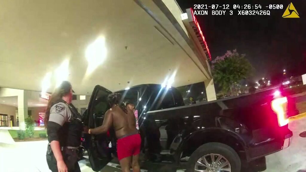 Leonard Holmes at the black Ford F-150 outside the Coliseum emergency room