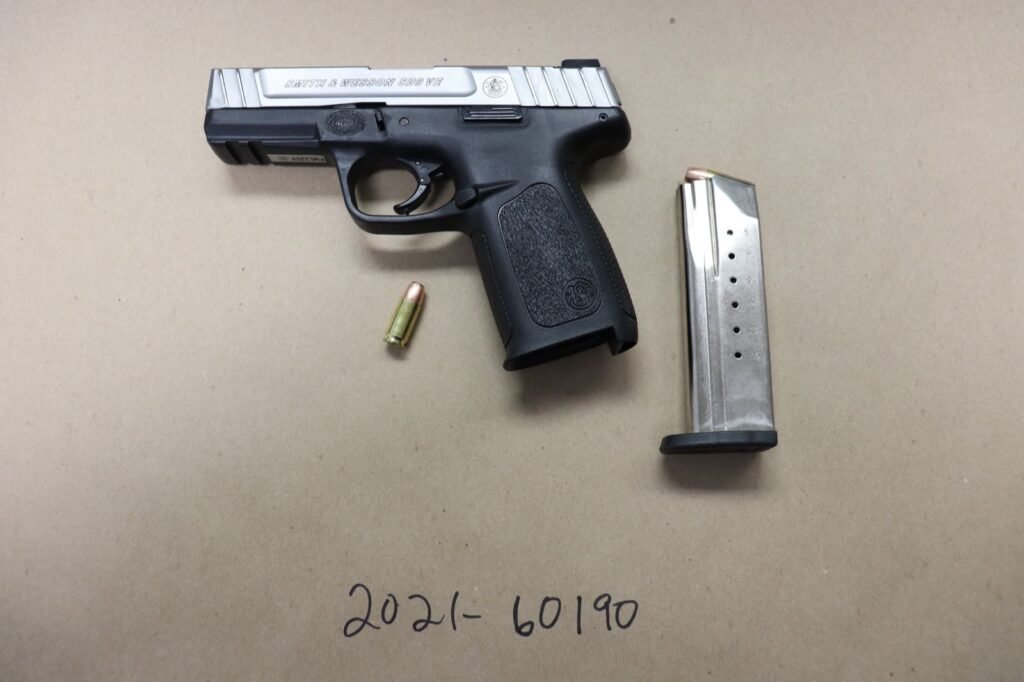 The Smith and Wesson SD9VE pistol, magazine and round photographed by the crime lab
